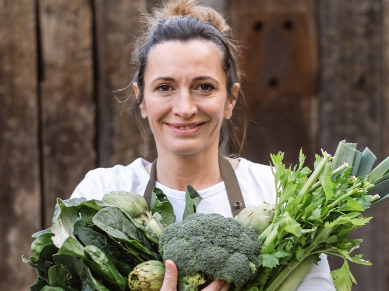 Chef Begona with seasonal locally grown produce